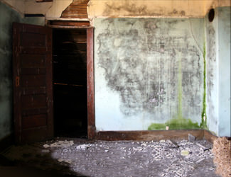 a fire and flood damaged home in Lawrenceville during major area flooding